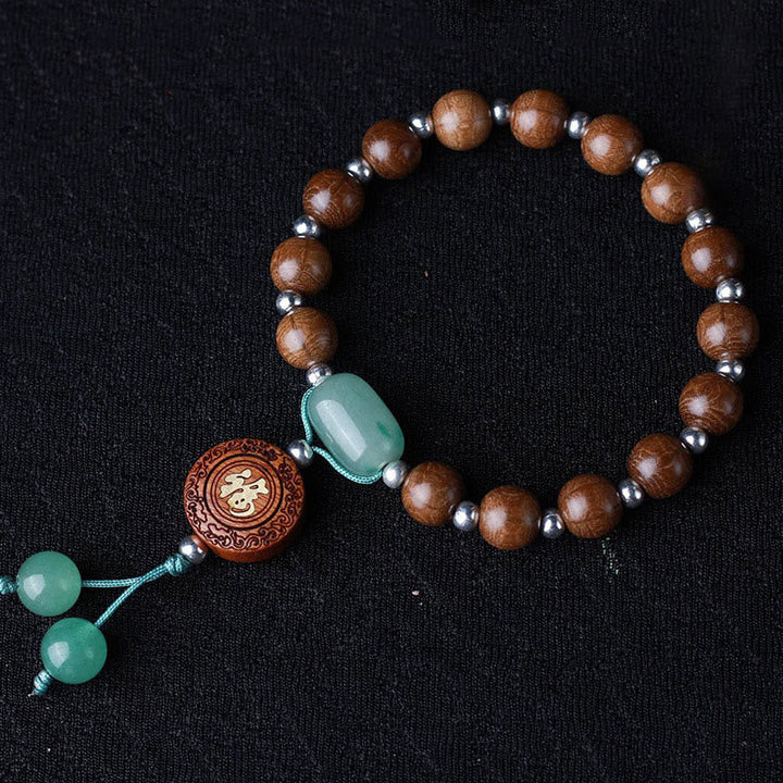 Holz Armband – Schutz & Glück & Harmonie mit Jade Perlen und Karving.