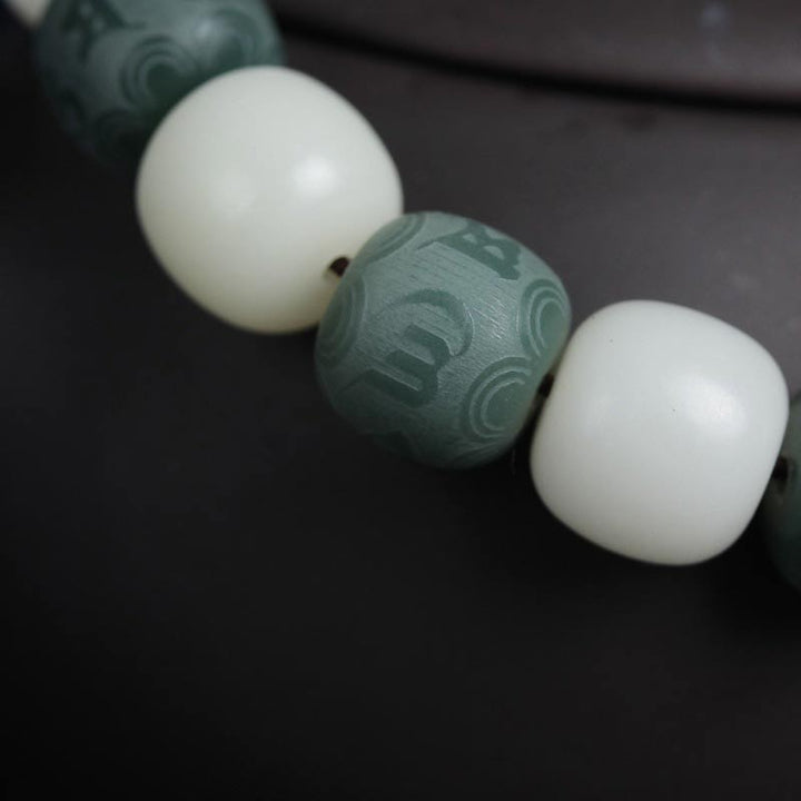 Armband Weiße Jade Bodhi Om Mani – Schutz grüner Stein Perlen Nahaufnahme