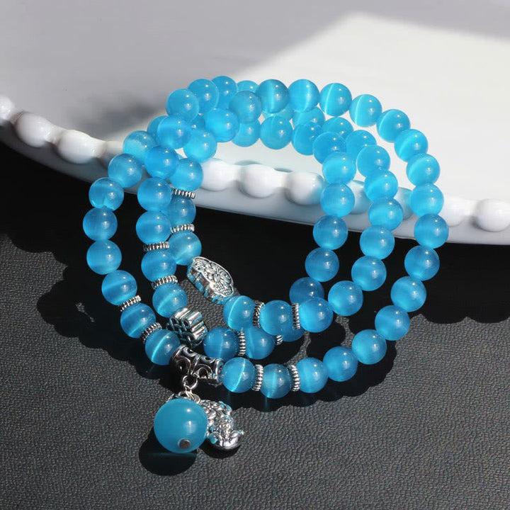 Armband Katzenauge PiXiu Dreifach türkis Perlen Silber elastisch Armgelenk