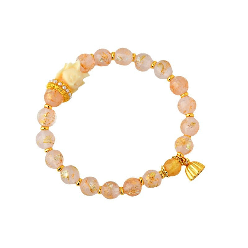 Armband Lotus – Glück mit Rosenquarz Perlen und goldenen Elementen