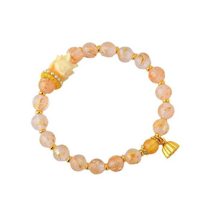 Armband Lotus – Glück mit Rosenquarz Perlen und goldenen Elementen