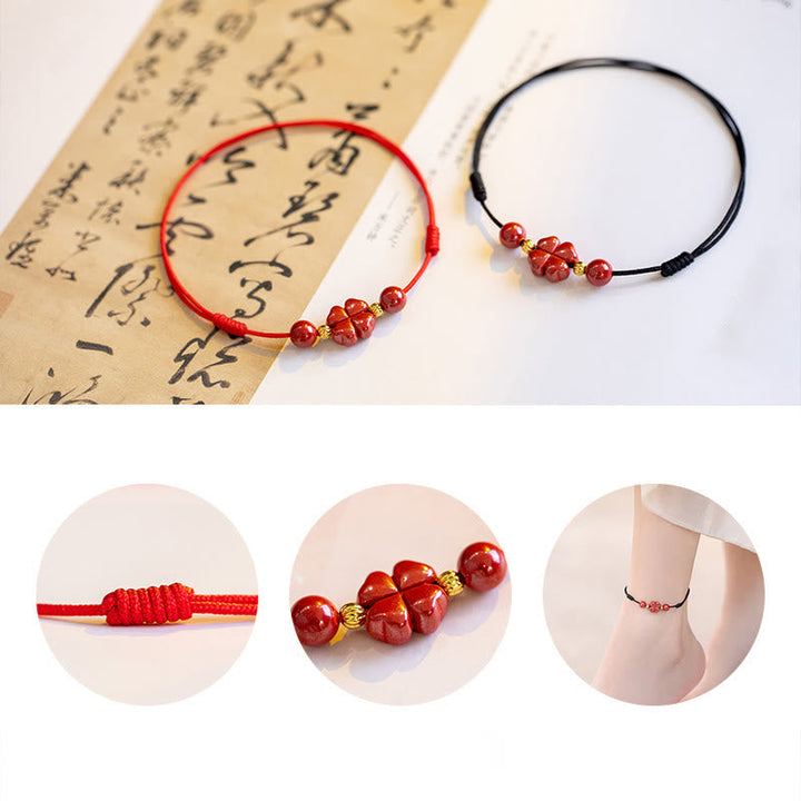 Zinnober Kleeblatt Armband rotes Perlenarmband mit chinesischen Schriftzeichen Flat Lay