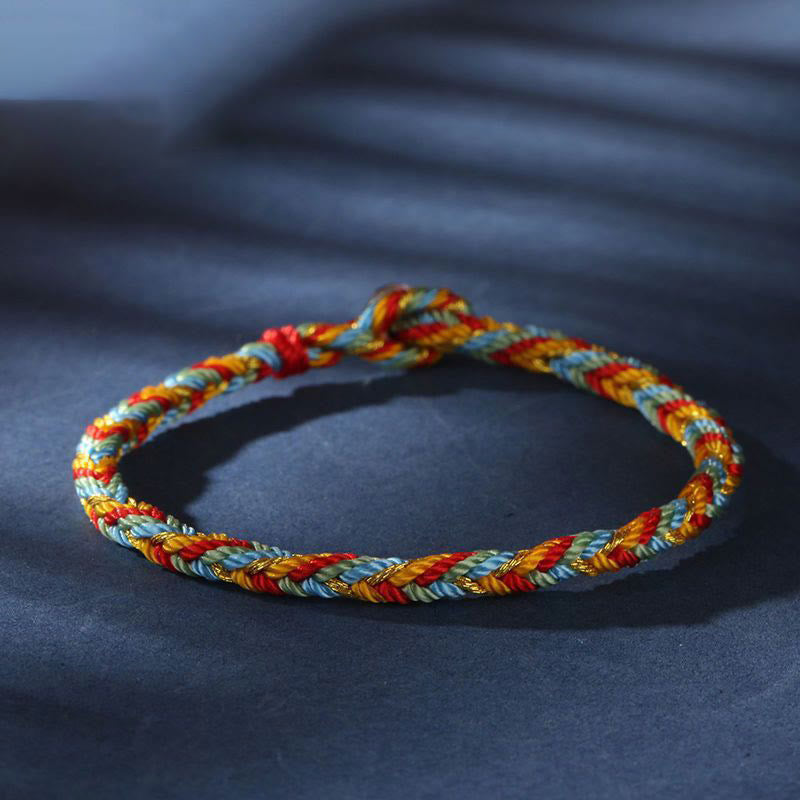 Mehrfarbiges Armband Flachlage gedreht Rot Blau Gold Schutz Glück
