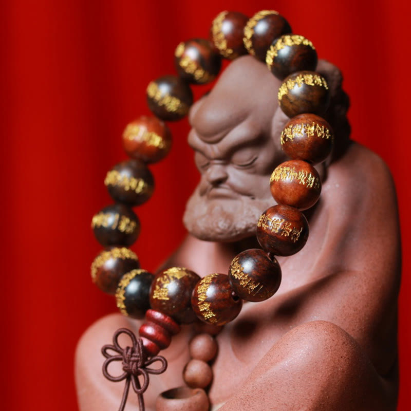 Armband Rosenholz Herzsutra mit goldenen Perlen elegantes Handgelenk