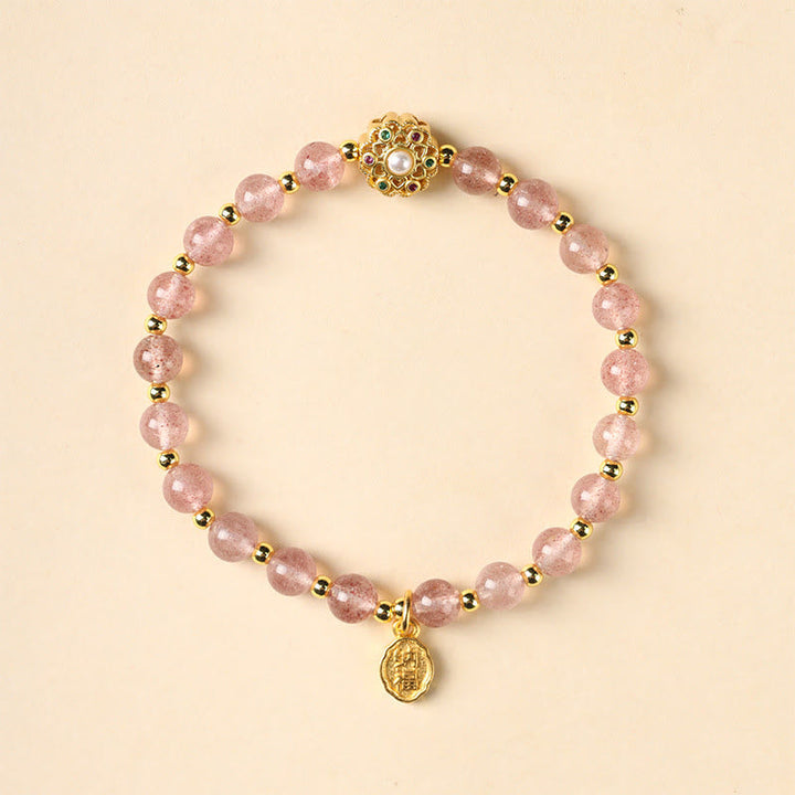 Armband Erdbeerquarz goldfarben Perlen Anhänger eleganter Schmuck