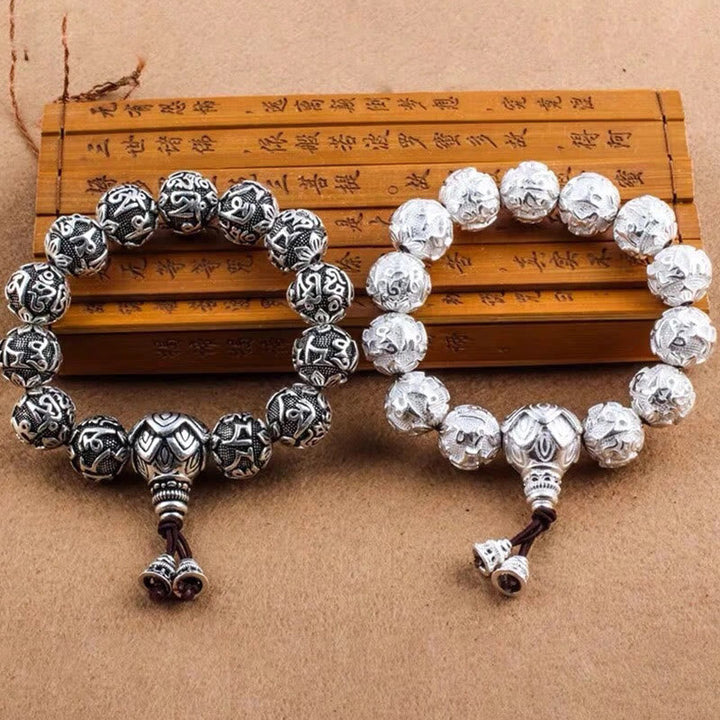 Zwei silberne Om Mani Padme Hum Armbänder mit Perlen Schmuck.