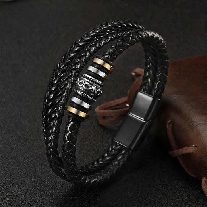 Armband – Balance schwarzes geflochtenes Leder Metallverschluss elegant getragen