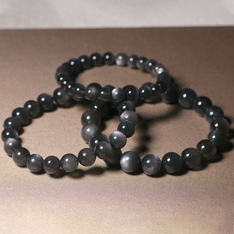 Mondstein Armband elastisch grau glänzend Naturstein Perlen Schmuck