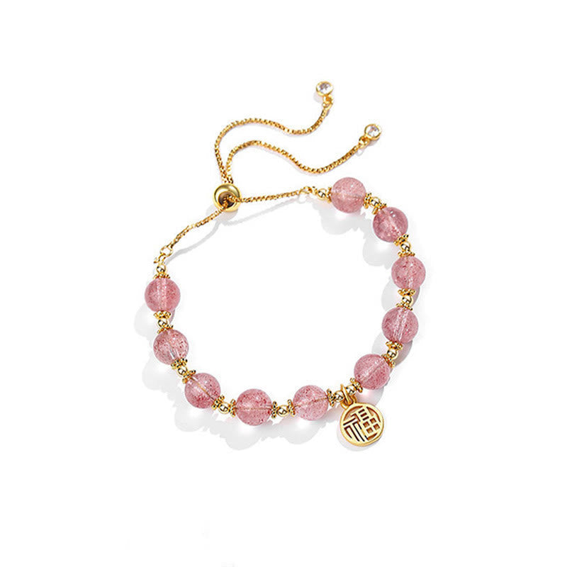 Armband Erdbeerquarz Fu-Zeichen – Energie golden verstellbar elegant.