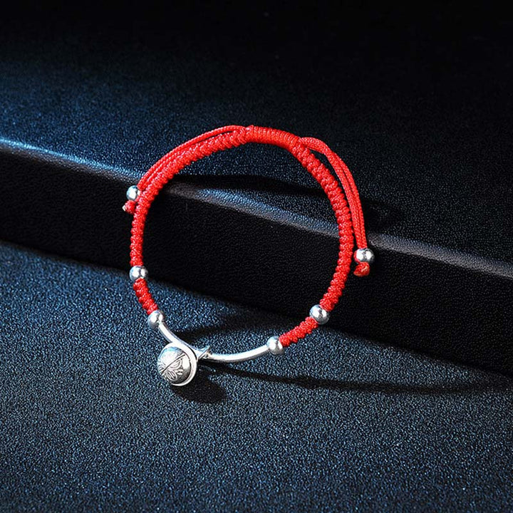 Rotes Schnur Armband mit Glocke und silbernen Perlen Glücksbringer
