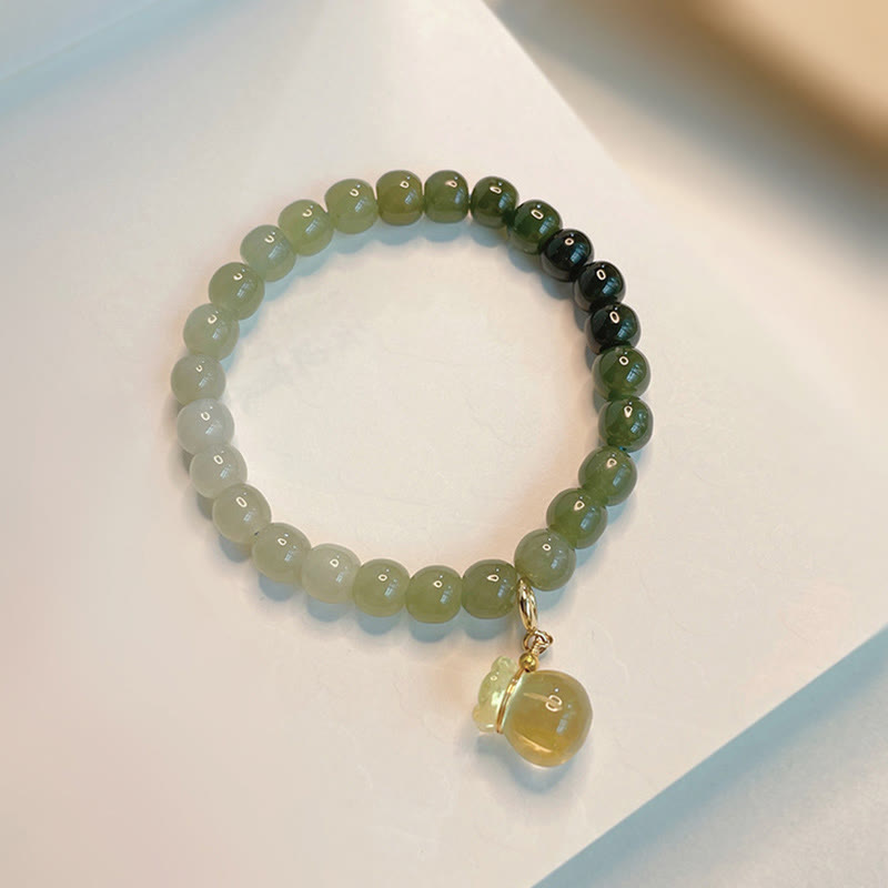Armband Jade – Wohlstand Balance grüne Naturstein Perlen Anhänger elegant.