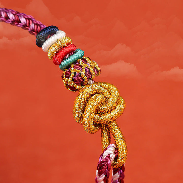 Buntes geflochtenes Armband Dunhuang Schutz mehrfarbig elastisch Handgelenk.