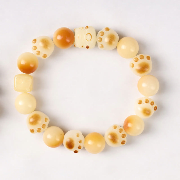 Armband Sandelholz Bodhi Katze Glück Frieden elastisch Naturstein beige