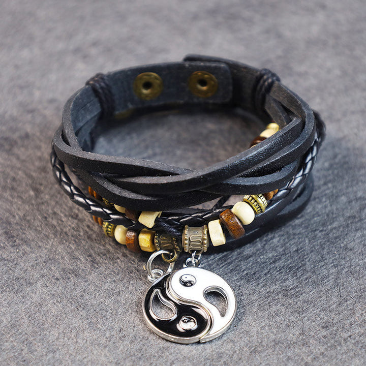 Schwarzes Lederarmband mit Yin Yang Anhänger und Holzperlen Drachen Balance