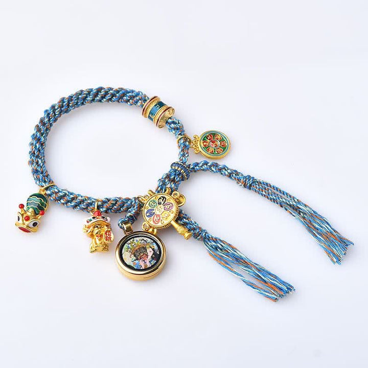 Armband – Glück & Wohlstand mit blauen Kordeln und goldenen Anhängern Flatlage