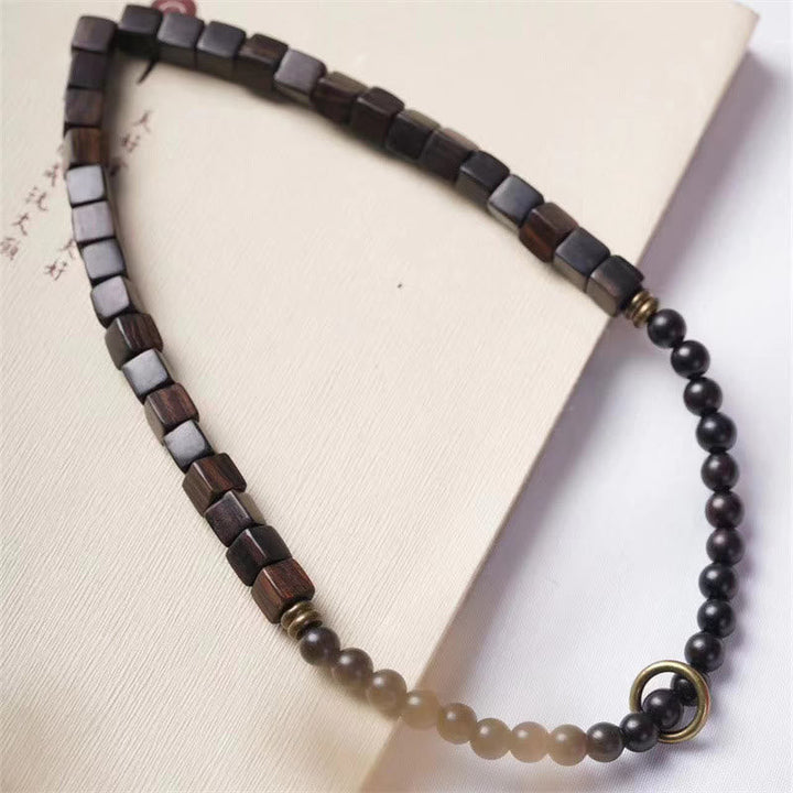 Armband Ebenholz – Frieden mit quadratischen Holzperlen und schwarzen Kugeln