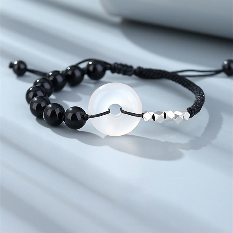Armband 925 Silber schwarzer Obsidian weiße Mondstein elastisch getragen