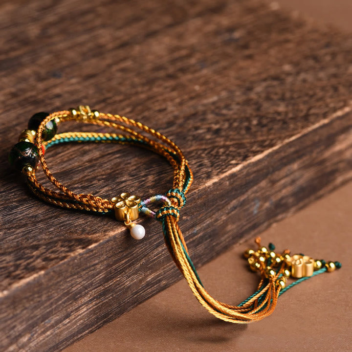 Goldenes Armband – Heilung & Stärke mit Perle und Türkis Details