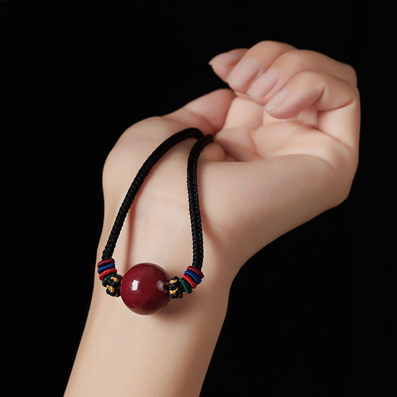 Tibetische Kette Zinnober Perle rote Kugel schwarzes Textilband Segen