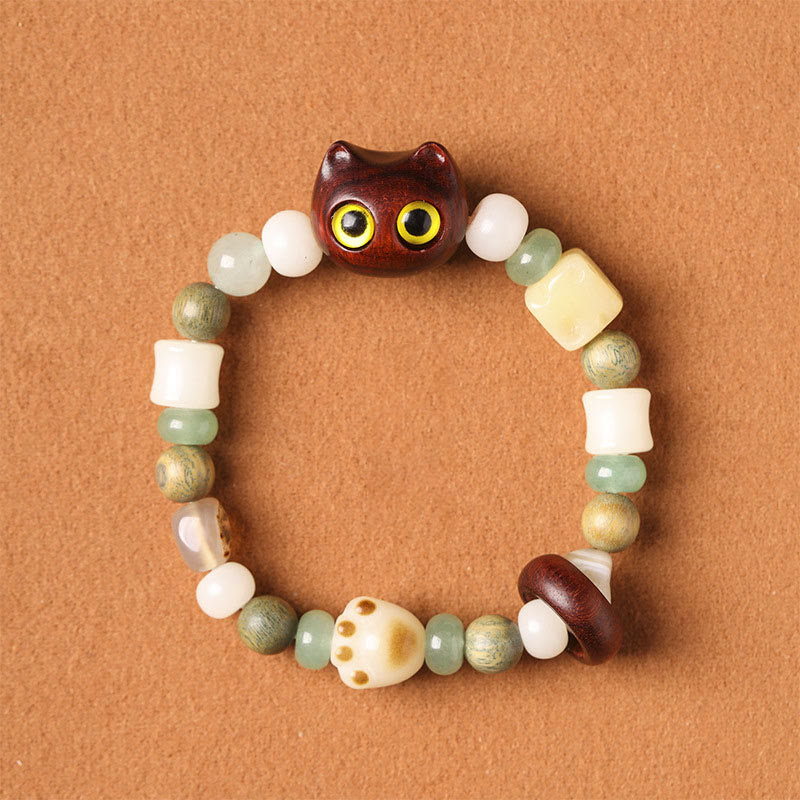 Armband Sandelholz Bodhi Katze mit grünen und weißen Perlen Frieden