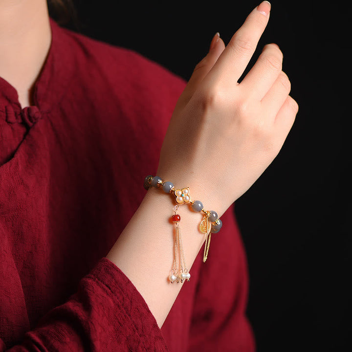 Armband Achat Perle Fu-Zeichen Balance am Handgelenk getragen elegant