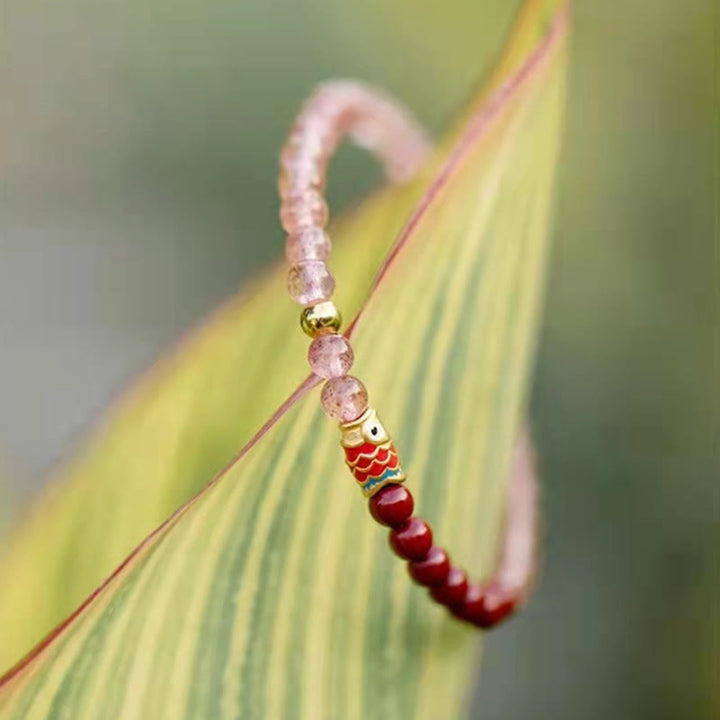 Armband Erdbeerquarz Zinnober Koi Fisch elastisch Naturstein Glück Heilung