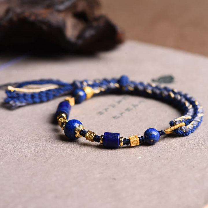 Armband Lazurit Perle Positiv blau gold Perlen elastisch Schnur