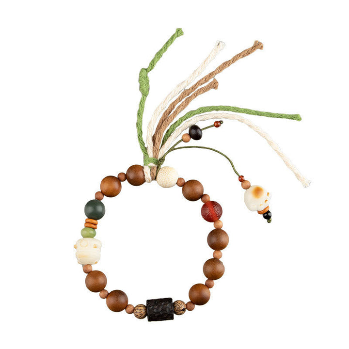 Bodhi Armband mit Holzperlen und Schutzsteinen elastisch tragbar