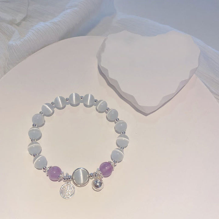 Armband Amethyst Fu-Zeichen Mondstein grau lila silber Perlen elastisch.