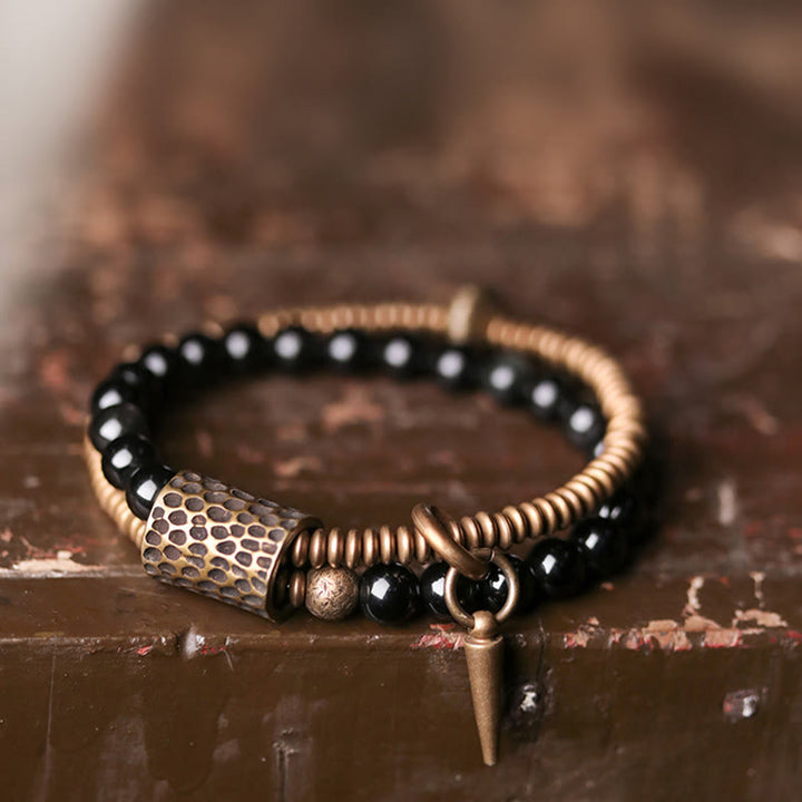 Armband Obsidian Kupfer mit schwarzen Perlen elastisch getragen