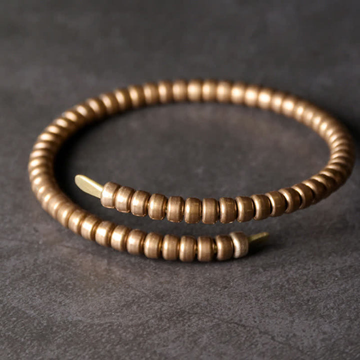 Kupfer Armband mit Rillenstruktur auf grauem Untergrund elastisch