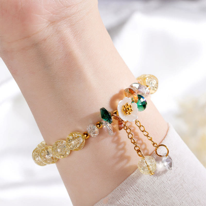 Armband Blume Glas mit Perlen und goldenen Kettenelementen