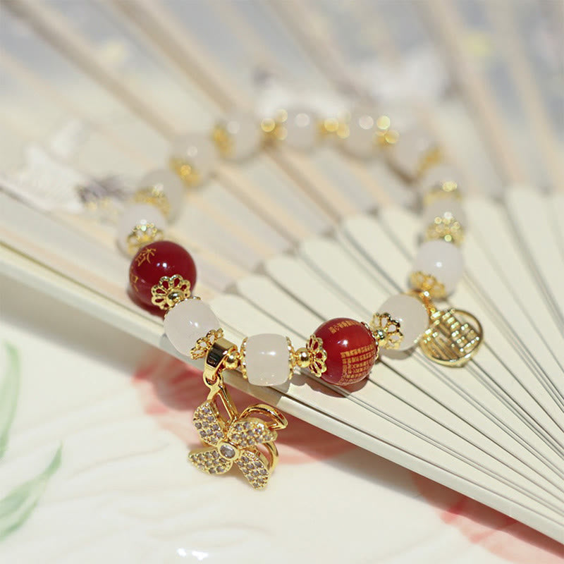 Armband Fu-Zeichen Segen mit roten Perlen weiß golden elegant