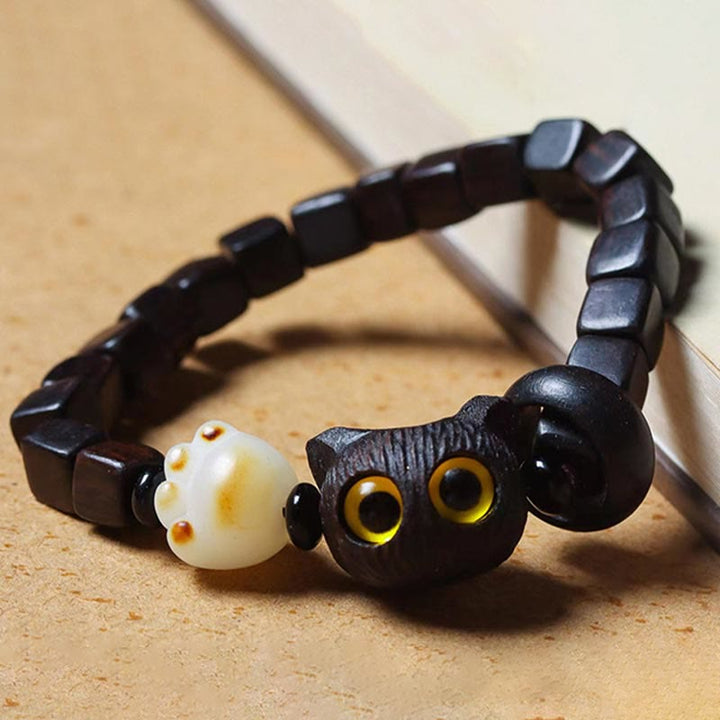 Armband Bodhi Ebenholz Katze mit gelben Augen elastisch schwarze Perlen