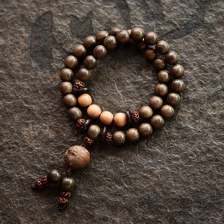 Mala Sandelholz – Schutz Armband mit Holzperlen und Metallakzenten Graustein