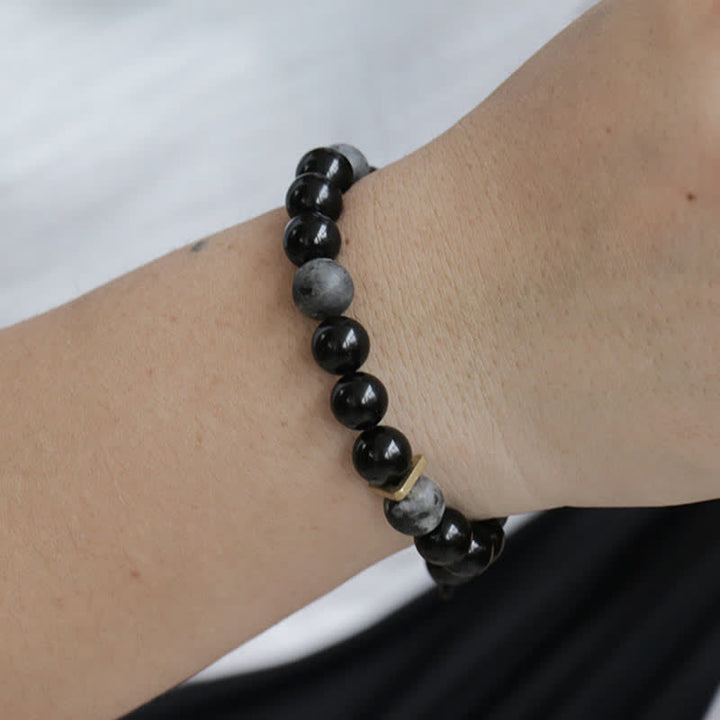 Armband Schwarzer Obsidian mit grauen Perlen elastisch am Handgelenk