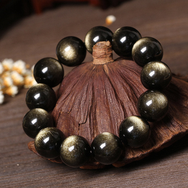 Armband Tibetanischer Obsidian schwarze glänzende Perlen Naturstein elastisch