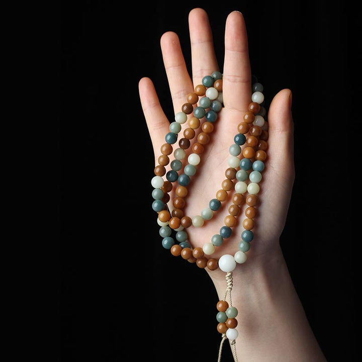 Mala Bodhi – Harmonie Perlenkette in Braun, Grün und Weiß an Hand