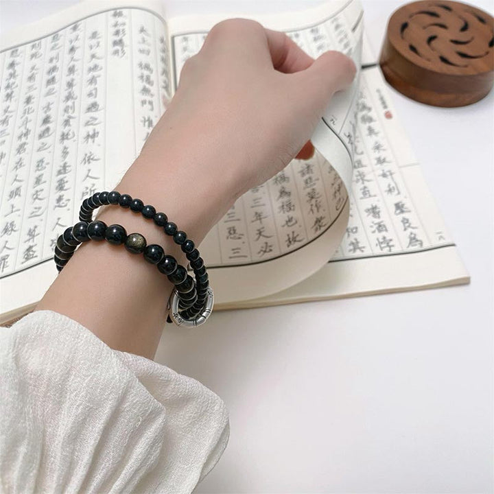 Obsidian Armband 925 Silber Schwarzer Obsidian am Handgelenk getragen elegant