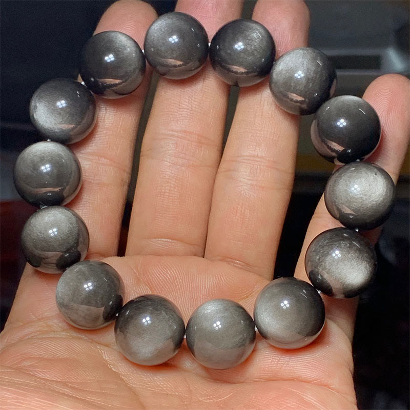 Armband Silber Obsidian – Schutz, glänzende graue Perlen Handgelenk getragen