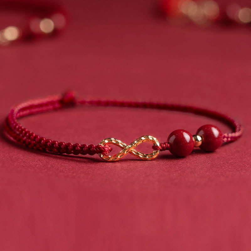 Armband Rotes Band Gold Infinity Symbol