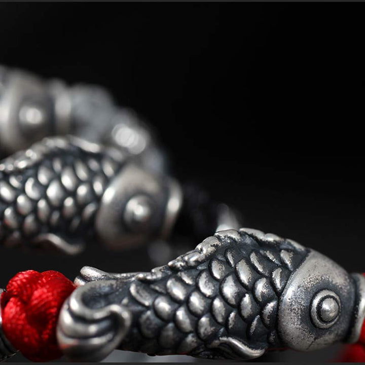 Armband Silber Koi Fisch – Glück rote Perlen schwarzes Metall elegant