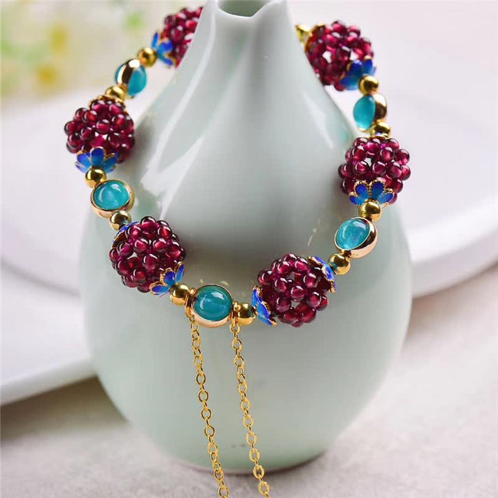Armband Granat Garnet Ruhe mit roten Steinen türkis Perlen goldfarben