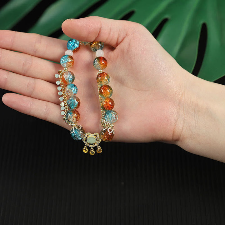 Buntes Liuli Glas Perlen Armband mit türkis und orange Steinen eleganz