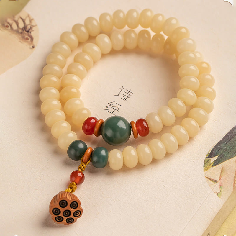 Bodhi Lotus Armband Armband mit Bodhi-Samen, Jade und roten Perlen elegant.