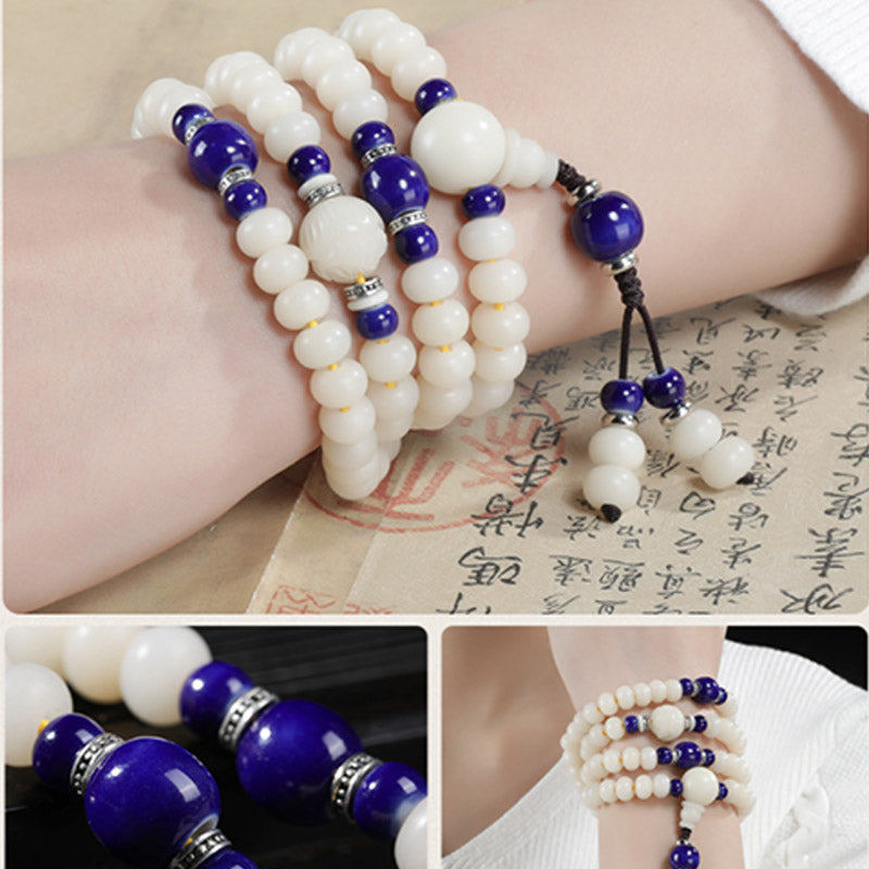 Armband Bodhi Lotus – Segen weiß blau Perlen elastisch Handgelenk getragen