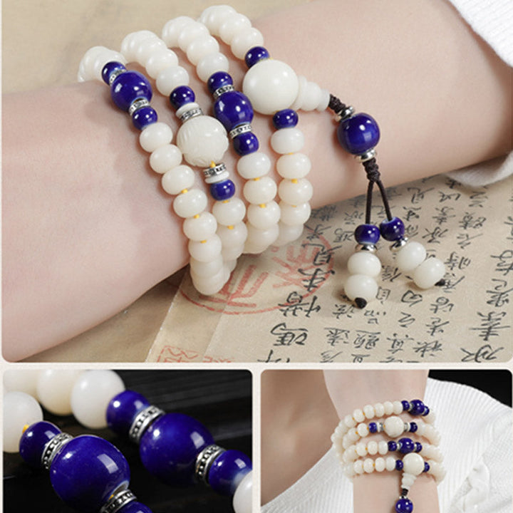 Armband Bodhi Lotus – Segen weiß blau Perlen elastisch Handgelenk getragen
