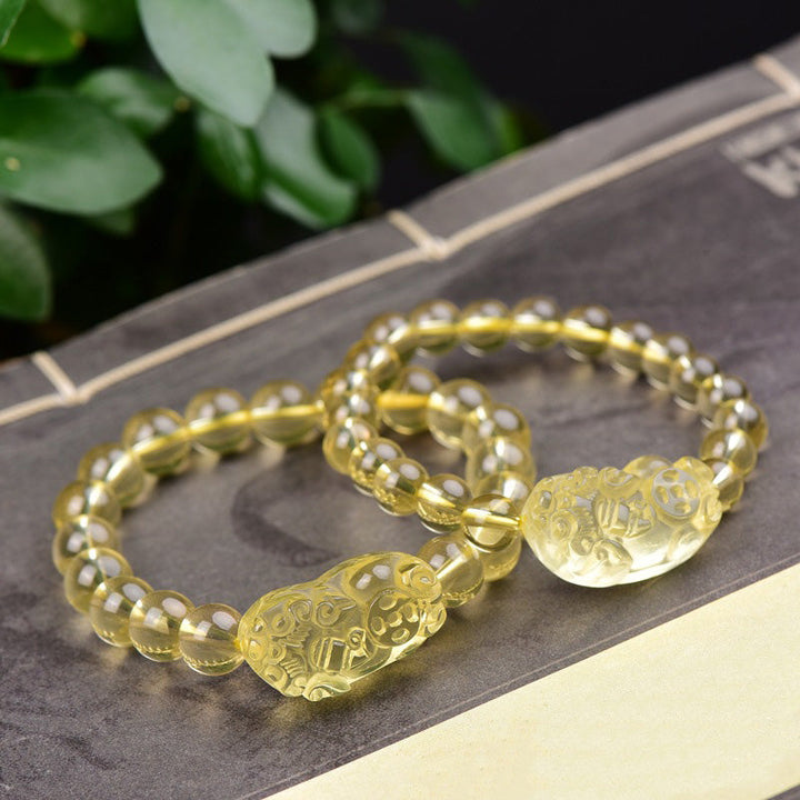Armband Citrin Pixiu – Wohlstand mit goldenen Perlen Flachaufnahme