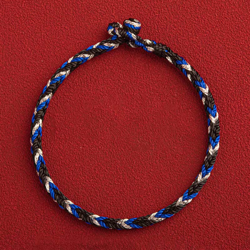 Glücksband Armband mehrfarbig blau schwarz weiß geflochten Flachansicht rot