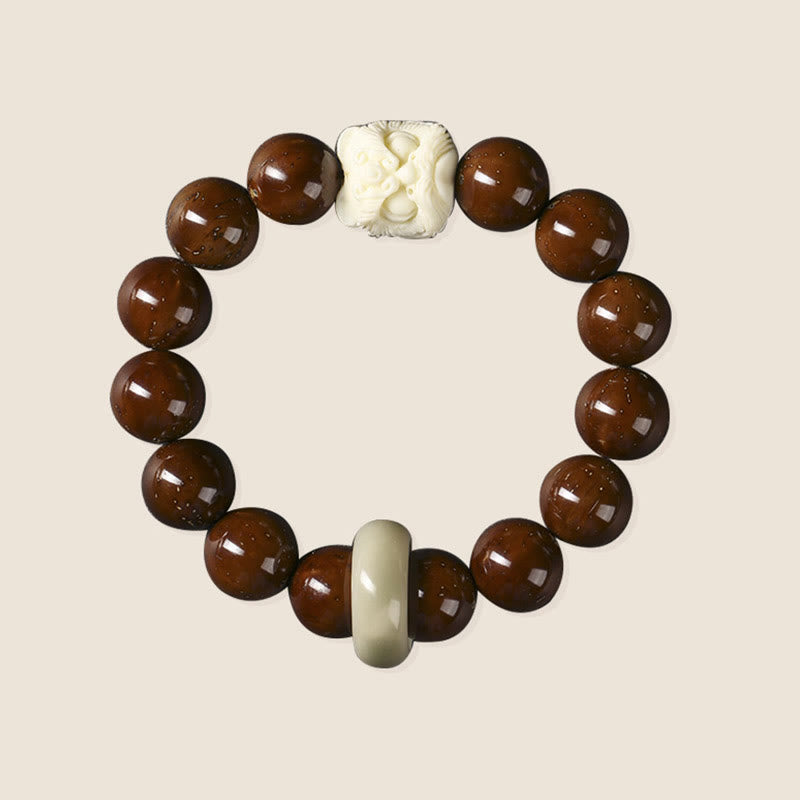 Armband aus braunen Bodhi-Samen mit cremefarbenen Zwischenperlen elastisch